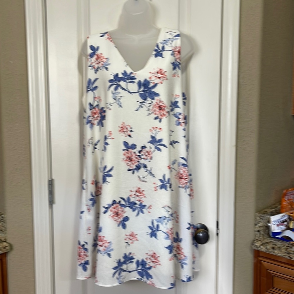 Cream colored with flor print dress size L